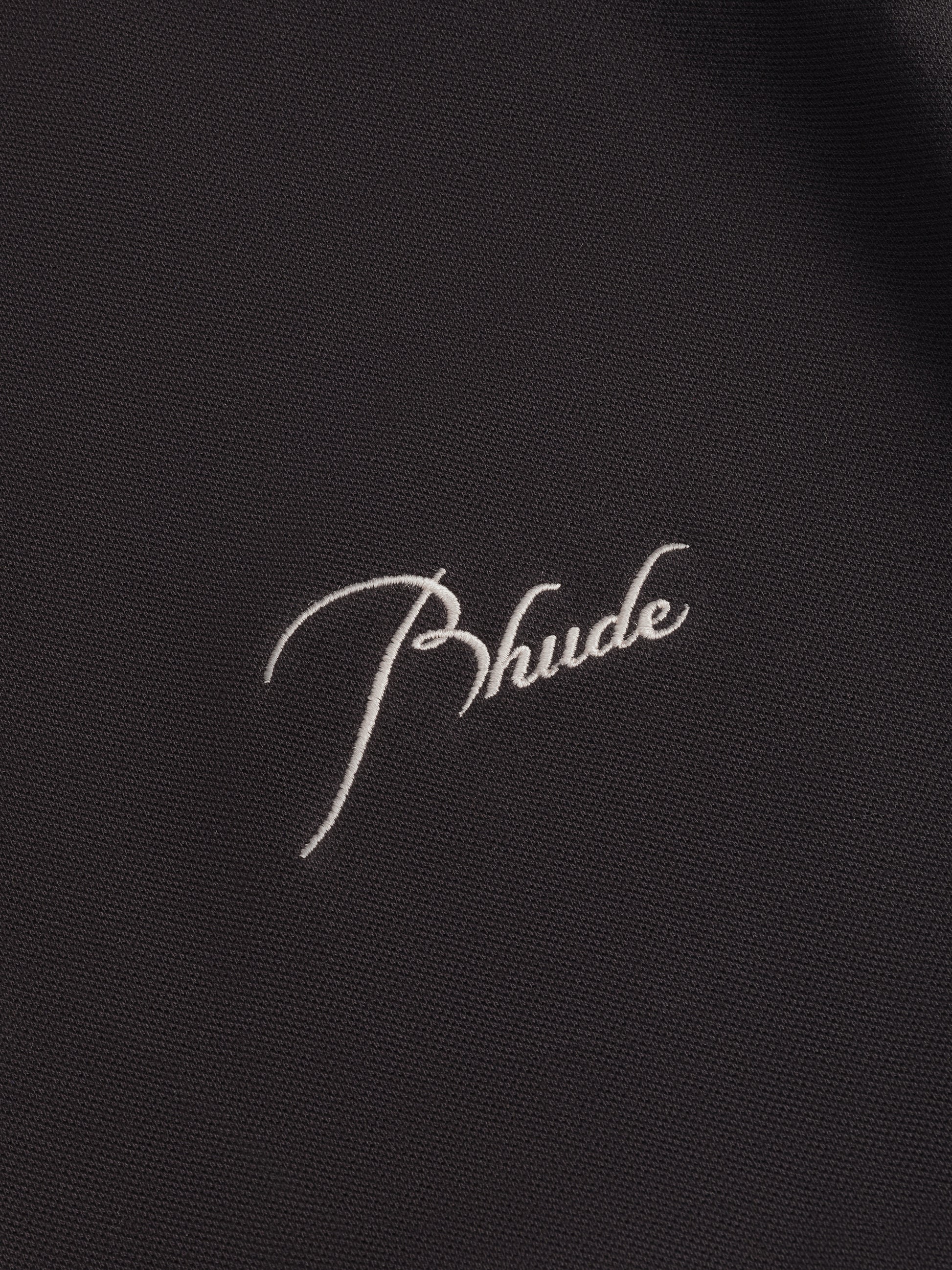 PIQUE SNAP SHORT SLEEVE POLO - BLACK
