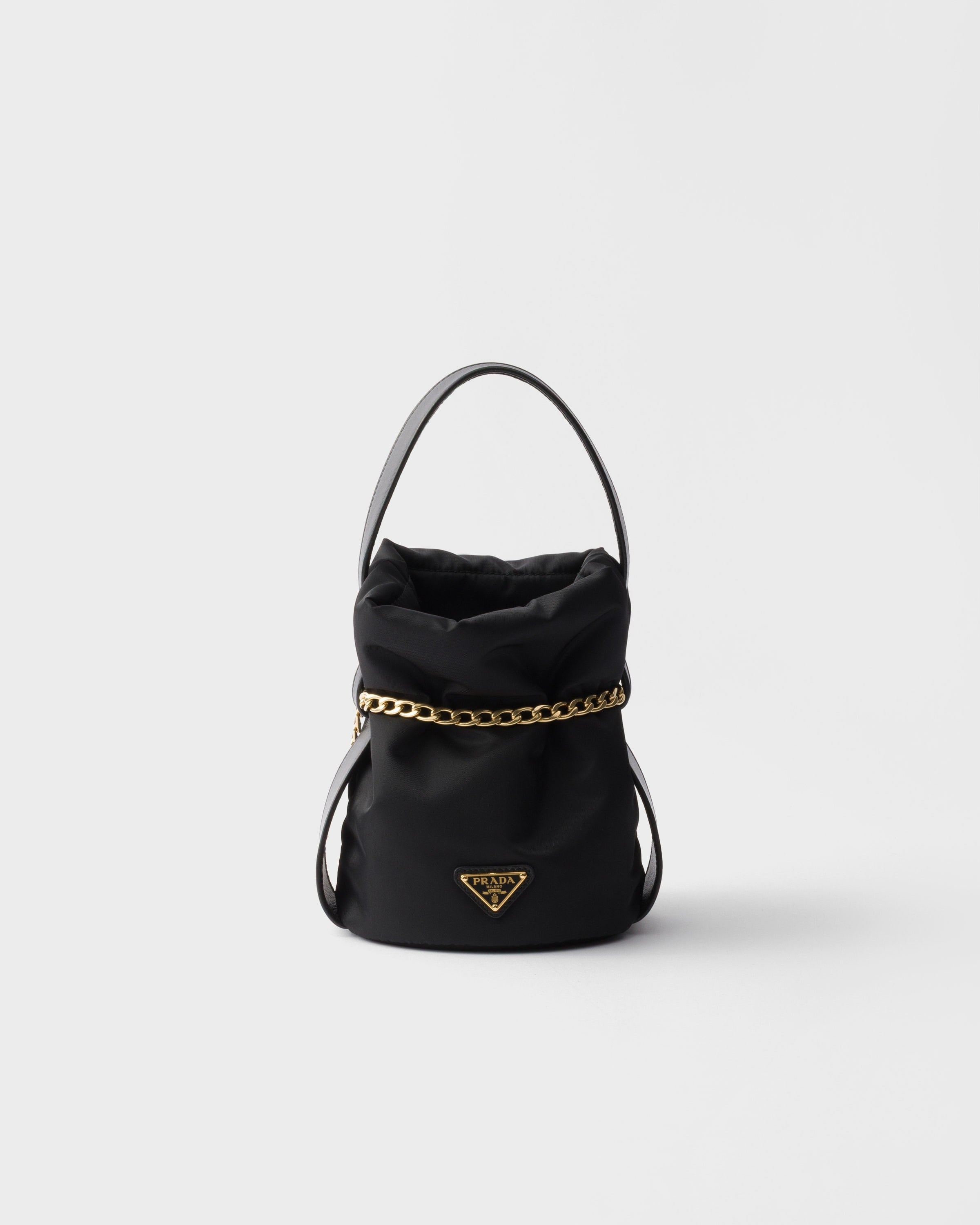 Petit Sac Noir Re-Nylon and nappa leather mini bucket bag Black