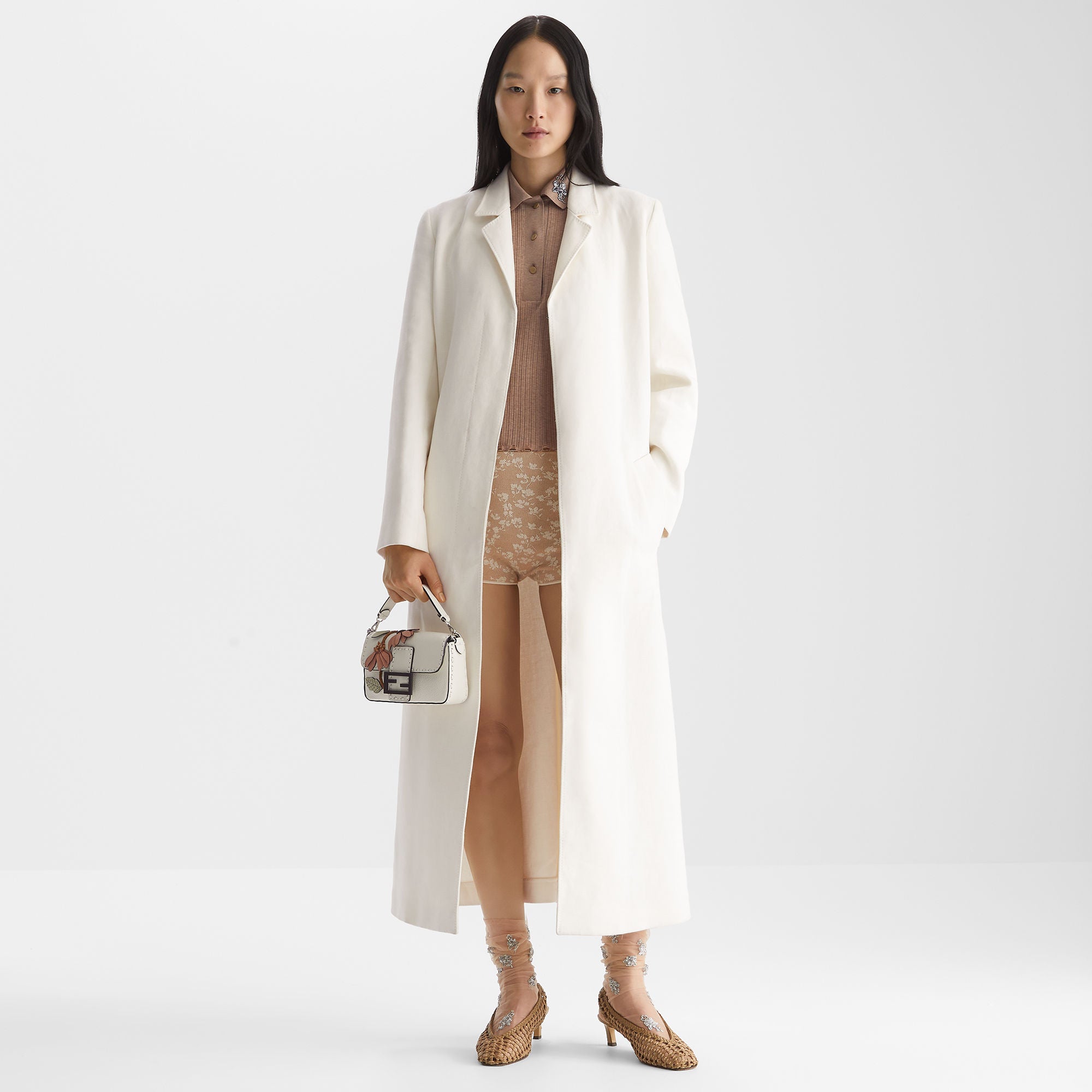 Baguette Mini White Selleria bag with floral motifs and 309 hand-sewn stitches