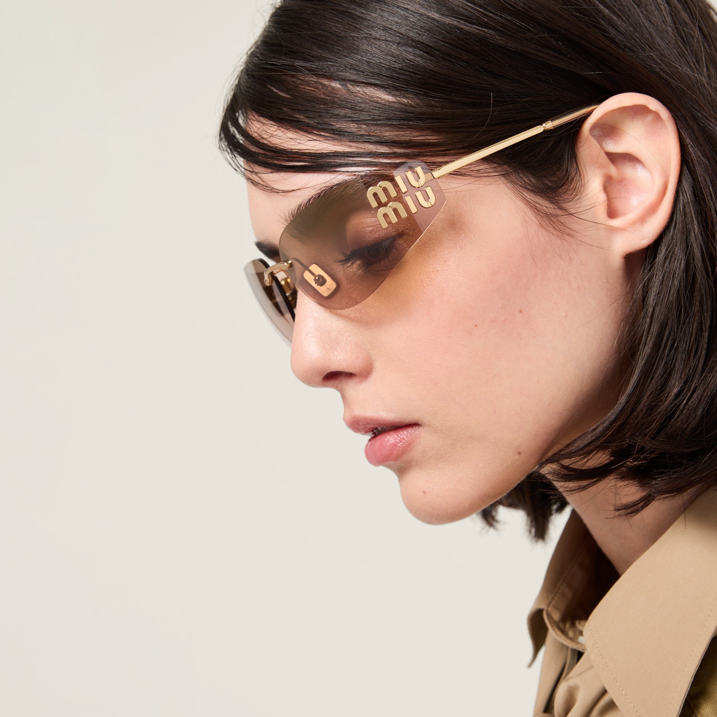 Miu Miu Logo sunglasses Bronze lenses