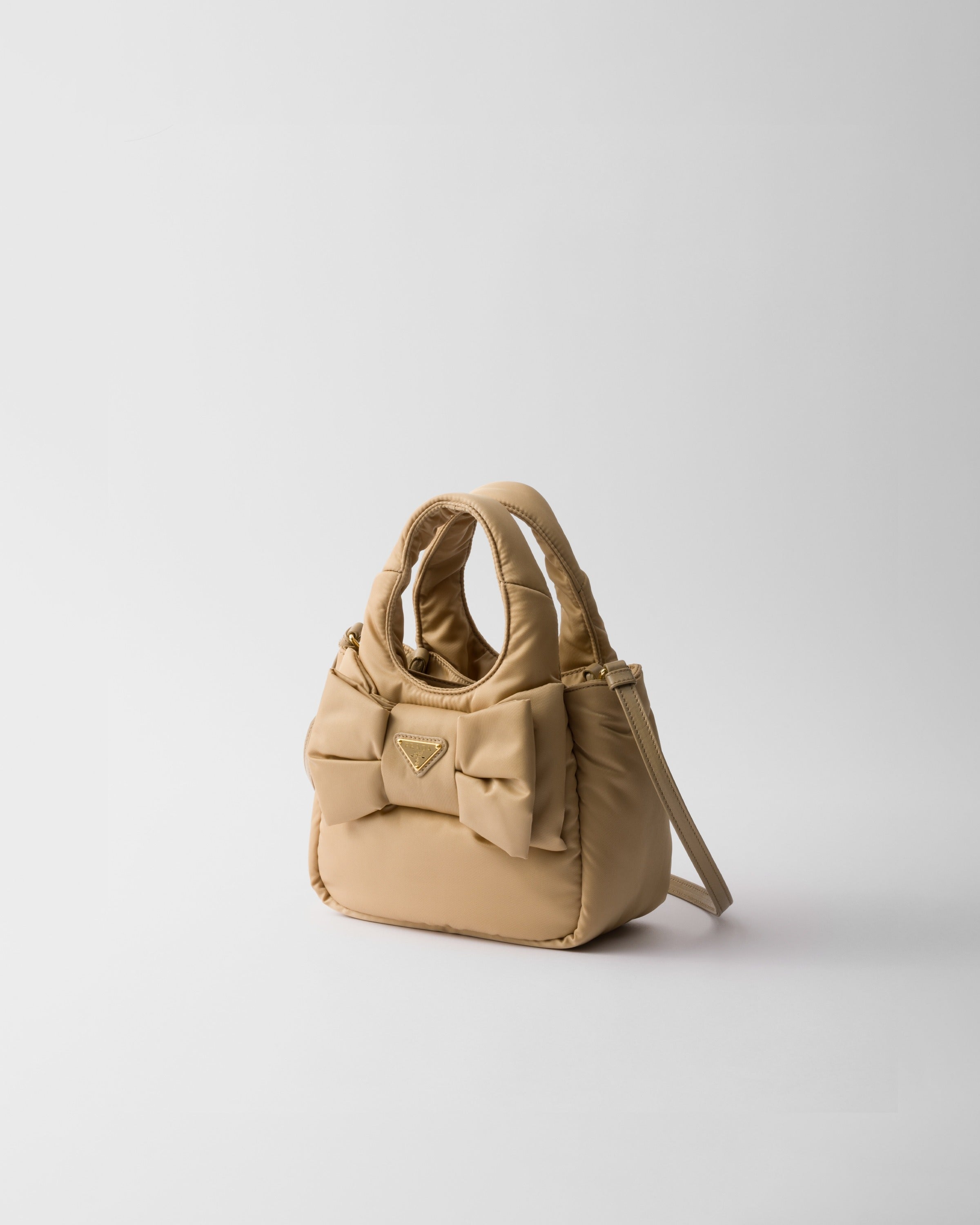 Padded Re-Nylon mini-bag with bow Camel Brown