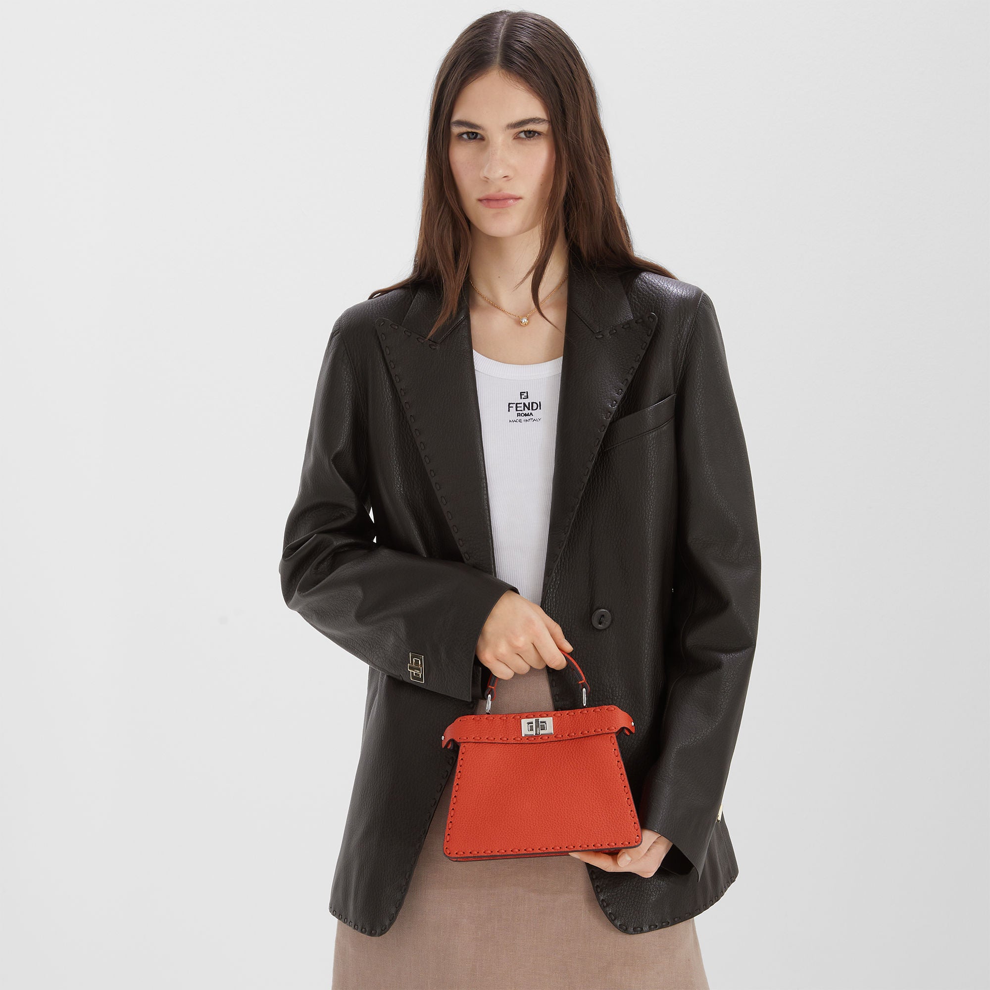 Peekaboo ISeeU Petite Orange Selleria bag with 306 hand-sewn topstitches