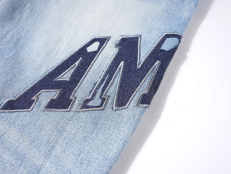 AMIRI Thrasher Distressed Jeans With Logo