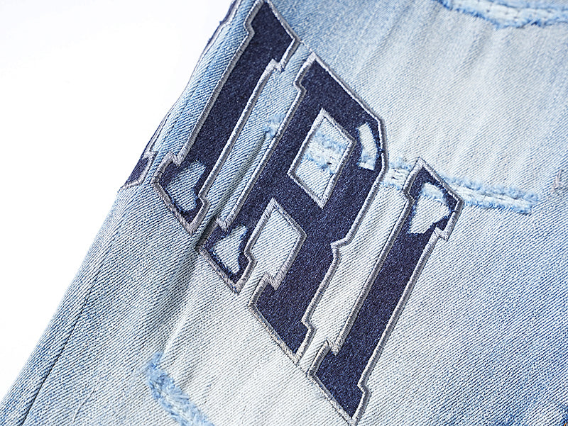 AMIRI Thrasher Distressed Jeans With Logo