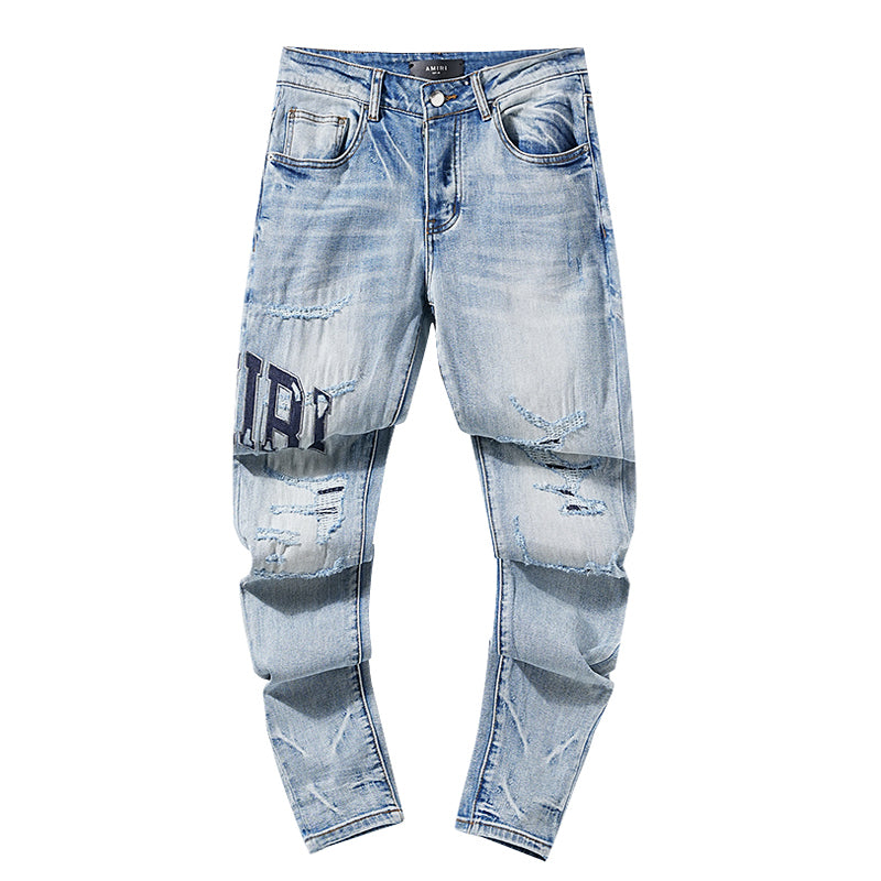 AMIRI Thrasher Distressed Jeans With Logo