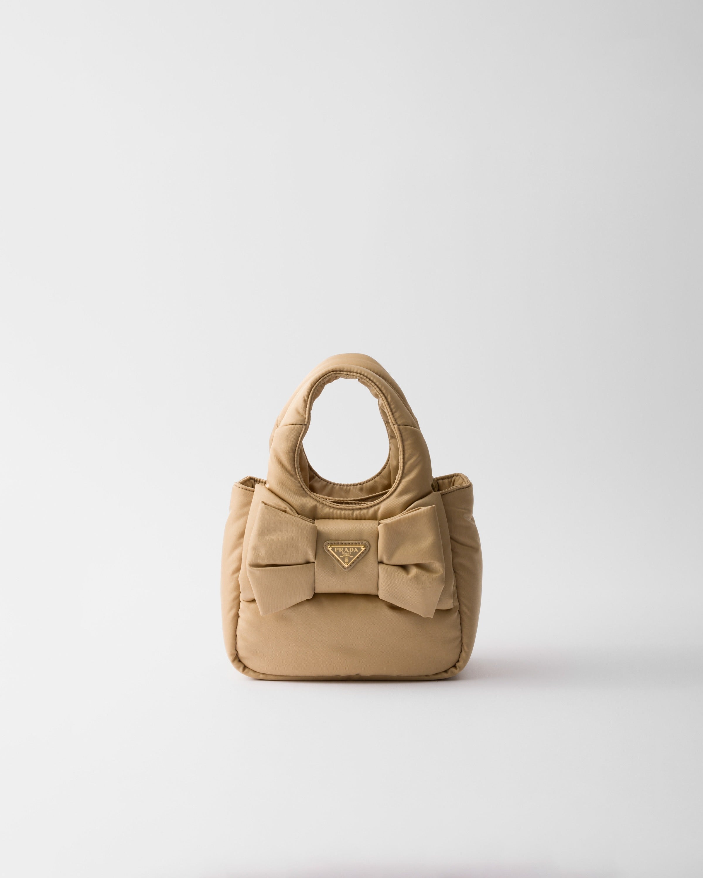 Padded Re-Nylon mini-bag with bow Camel Brown