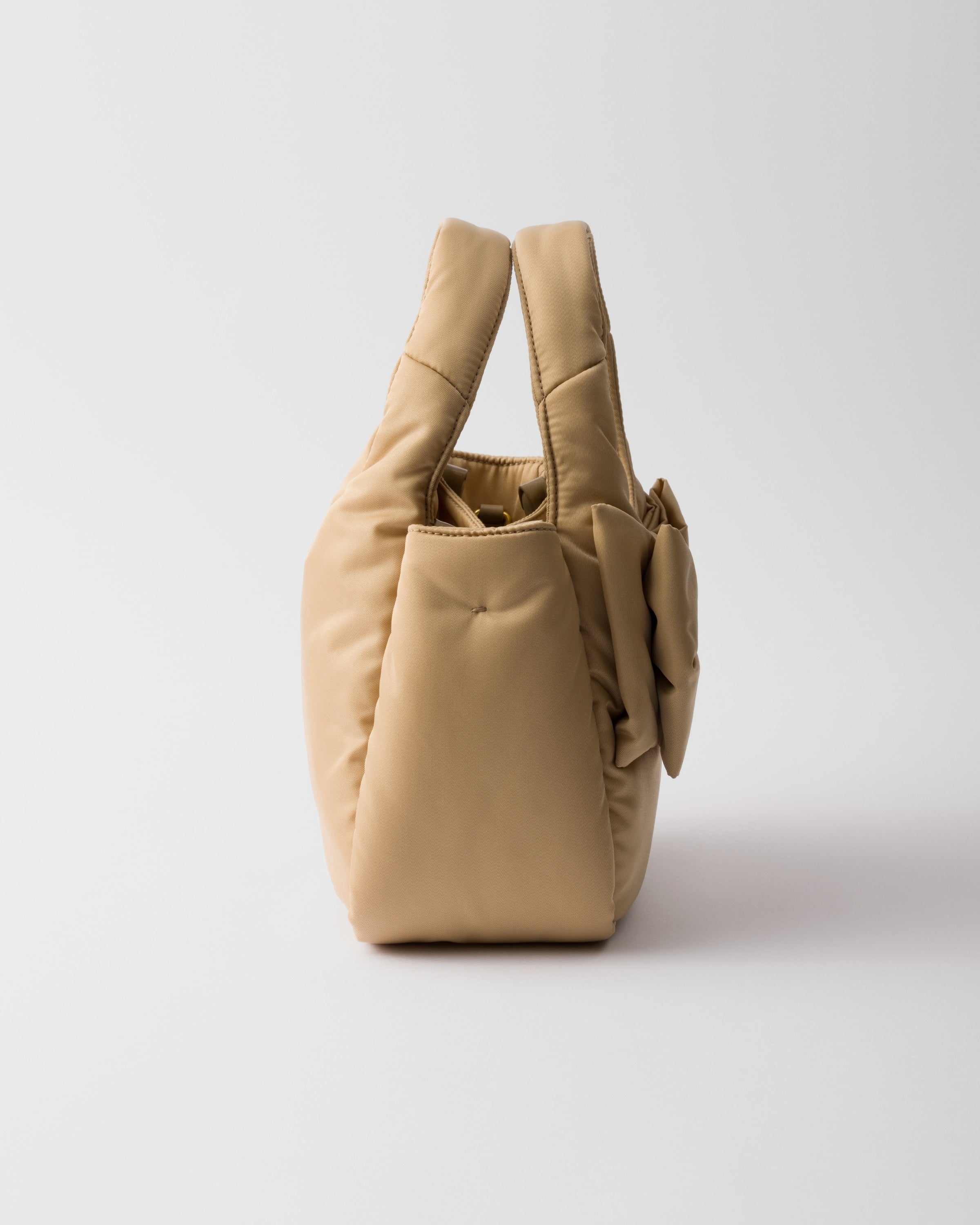 Padded Re-Nylon mini-bag with bow Camel Brown