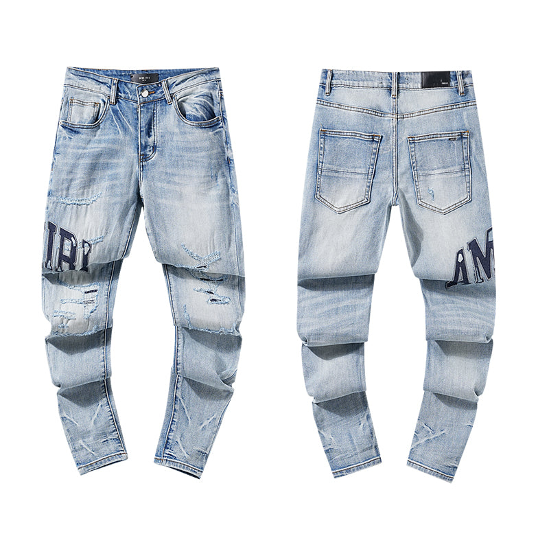 AMIRI Thrasher Distressed Jeans With Logo